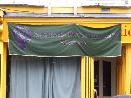 'Celebrate Revolutionary Women' banner on display outside Solidarity Books